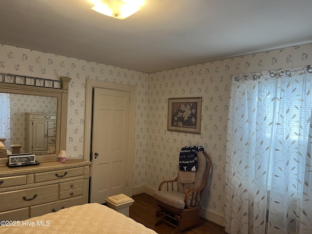 bedroom featuring dark wood-type flooring