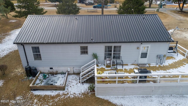 view of snow covered property