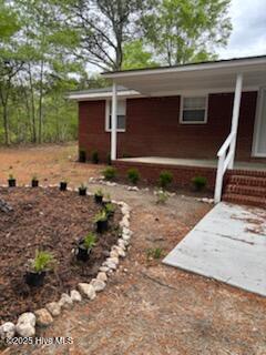 view of home's exterior featuring entry steps