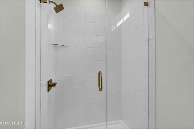 bathroom featuring a stall shower