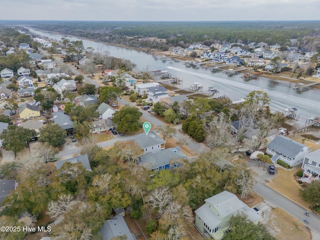 aerial view with a residential view and a water view