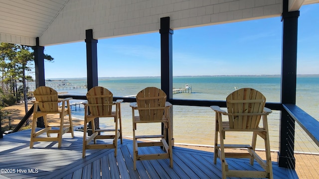 wooden terrace with a water view