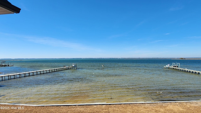 dock area featuring a water view