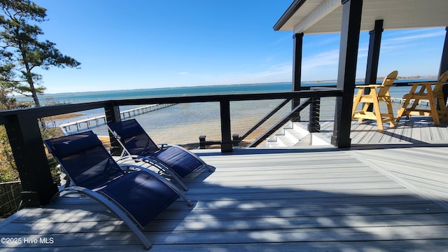 wooden terrace with a water view