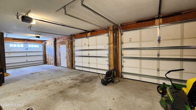 garage featuring a garage door opener