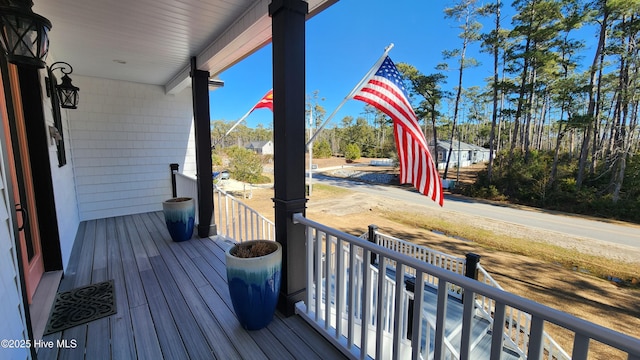 wooden deck featuring a porch