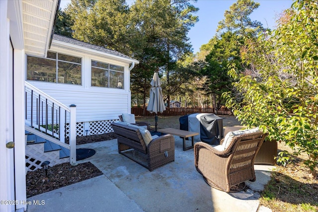 view of patio / terrace featuring a grill and an outdoor hangout area