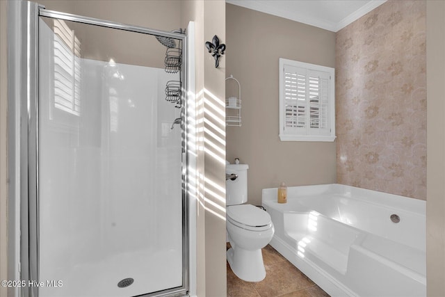 bathroom with ornamental molding, separate shower and tub, a wealth of natural light, and toilet