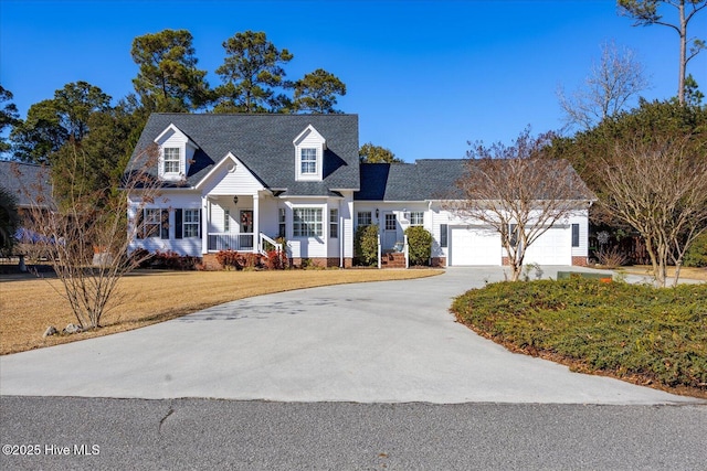 new england style home with a garage and a front lawn