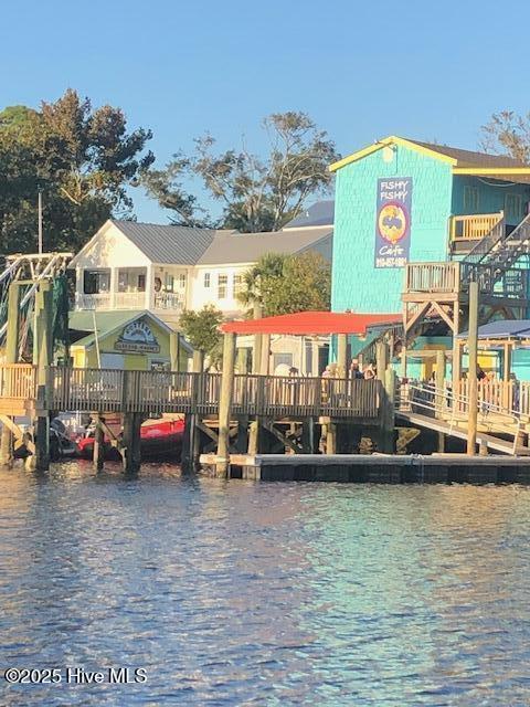 dock area featuring a water view