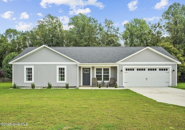 single story home with a garage and a front lawn