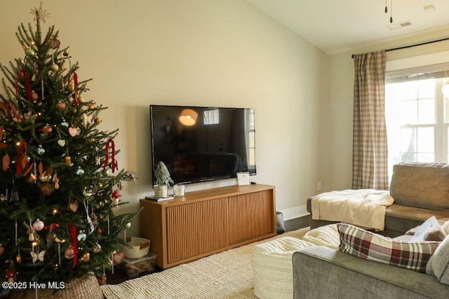 living room with lofted ceiling