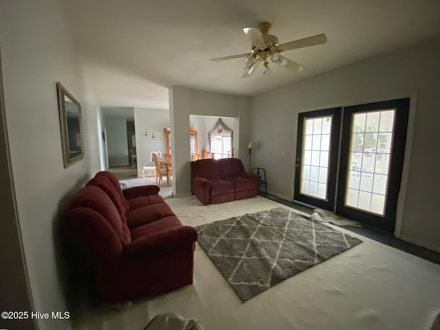 living room featuring ceiling fan