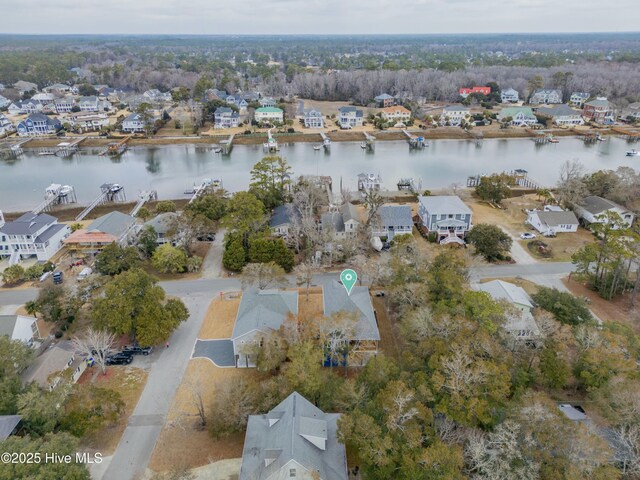 aerial view featuring a residential view and a water view