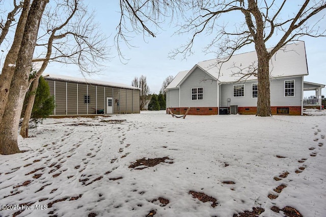 view of snow covered property