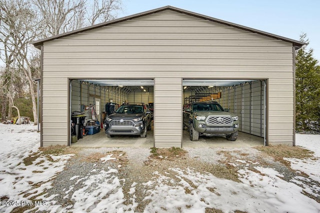 view of snow covered garage