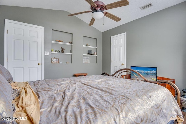 bedroom featuring lofted ceiling and ceiling fan