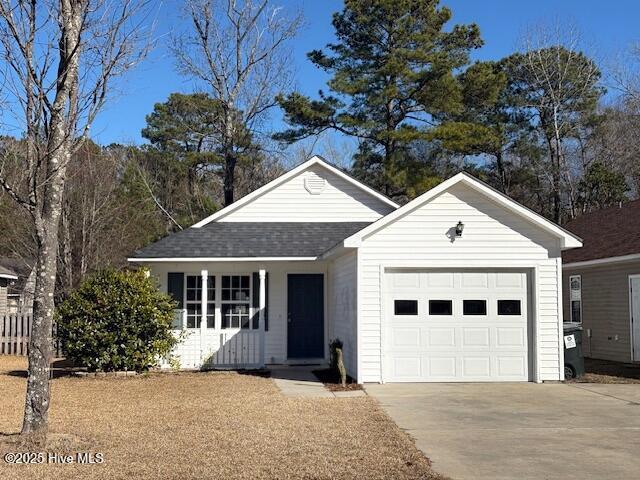 ranch-style house featuring a garage