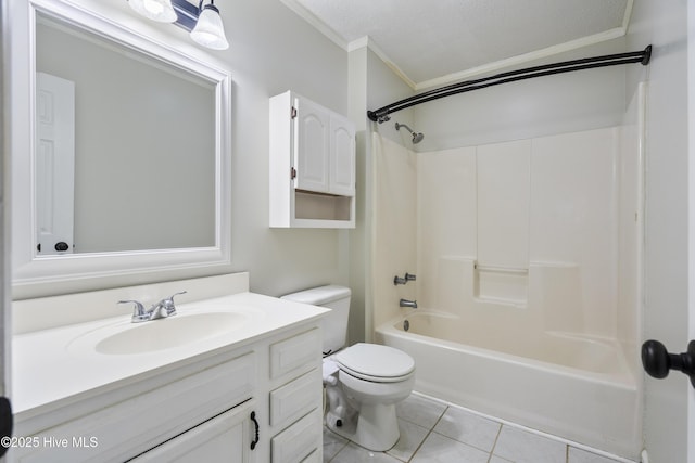 full bathroom featuring vanity, ornamental molding, tile patterned floors, and shower / bathtub combination