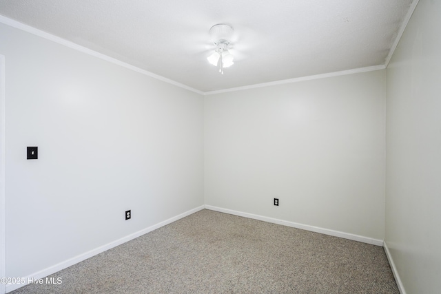 carpeted empty room with ornamental molding