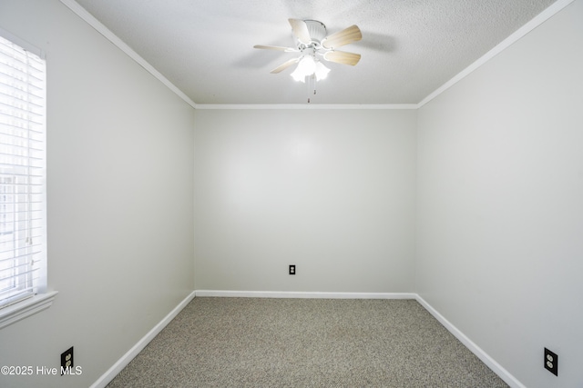 carpeted empty room with ornamental molding, a textured ceiling, and ceiling fan