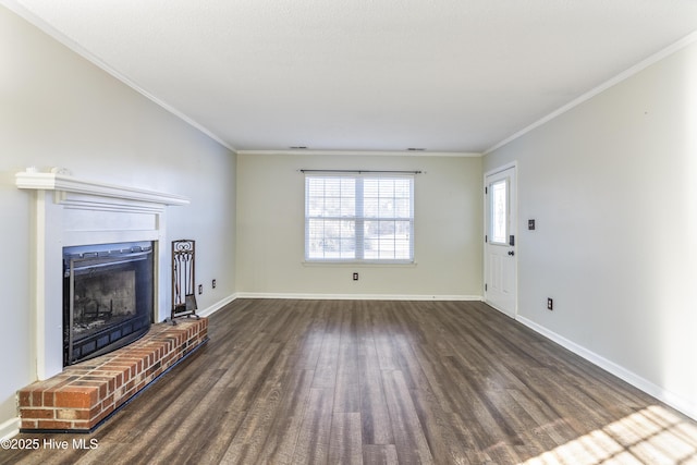 unfurnished living room featuring crown molding, dark hardwood / wood-style floors, and a fireplace