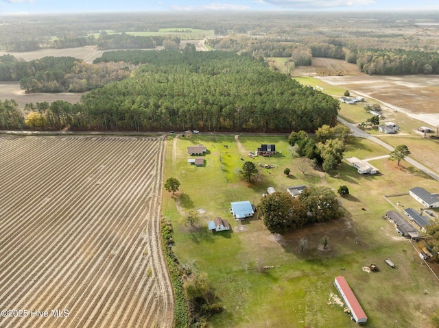 birds eye view of property with a rural view