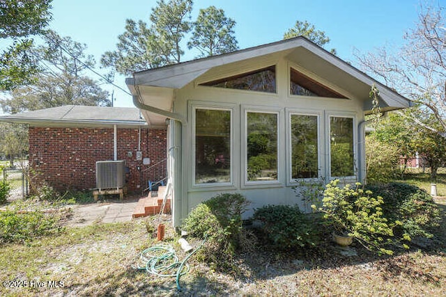 161 Willetts Dr, Boiling Spring Lakes, NC 28461 - view of side of property featuring central AC and brick siding