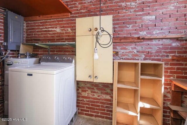 161 Willetts Dr, Boiling Spring Lakes, NC 28461 - laundry room with washer / dryer, brick wall, and electric panel
