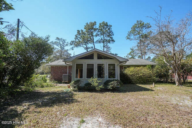 161 Willetts Dr, Boiling Spring Lakes, NC 28461 - back of property with a yard