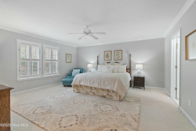 carpeted bedroom featuring ceiling fan, ornamental molding, and a textured ceiling