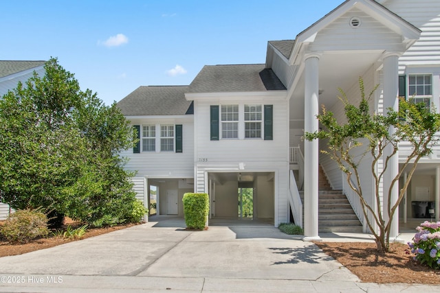 view of front of home featuring a carport