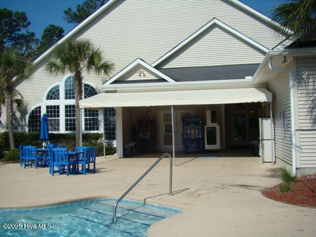 back of house featuring a patio