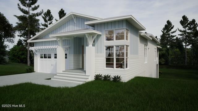 view of front facade with a garage and a front lawn