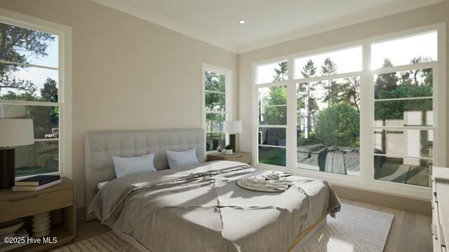 bedroom featuring crown molding, access to outside, and hardwood / wood-style floors