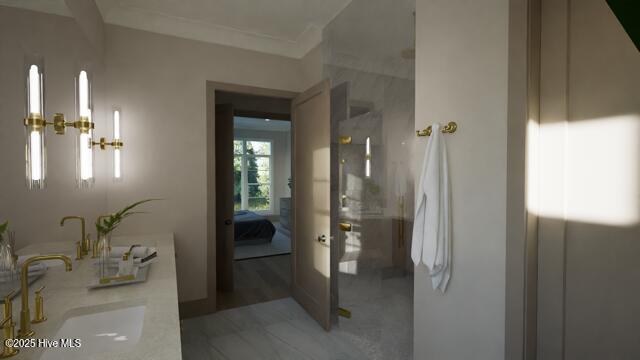 bathroom with sink and crown molding