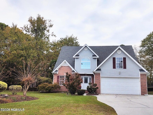 view of front of house featuring a garage and a front yard