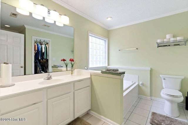 bathroom featuring tile patterned flooring, crown molding, and vanity