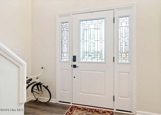 entrance foyer with hardwood / wood-style floors