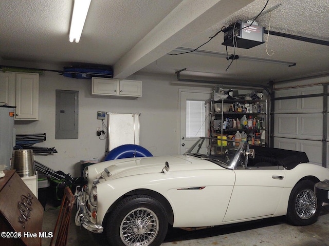 garage featuring a garage door opener and electric panel