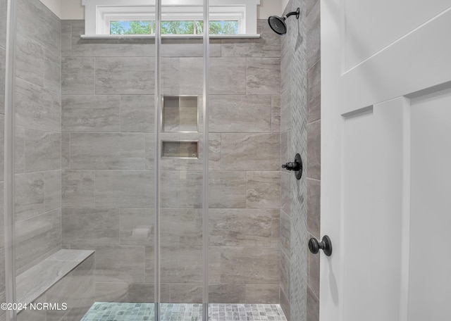bathroom with a stall shower