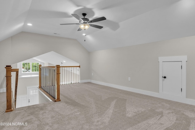 bonus room featuring baseboards, carpet, ceiling fan, and vaulted ceiling