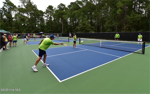 view of tennis court with basketball court