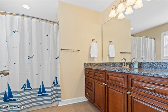 bathroom with vanity and tile patterned flooring