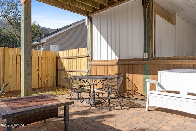 view of patio featuring a jacuzzi