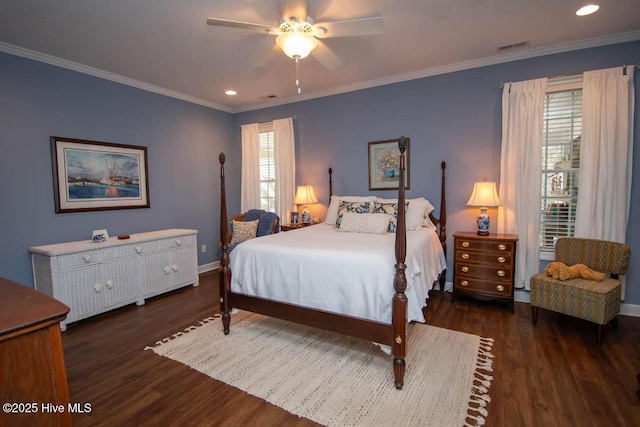 bedroom with dark hardwood / wood-style flooring, ornamental molding, and ceiling fan