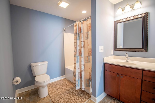 full bathroom with shower / tub combo, vanity, tile patterned floors, and toilet