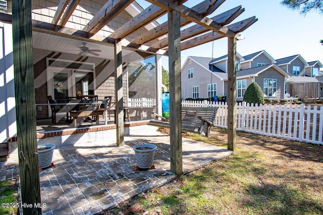 view of patio / terrace featuring a pergola and ceiling fan