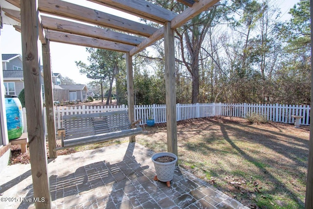 view of yard with a pergola and a patio area