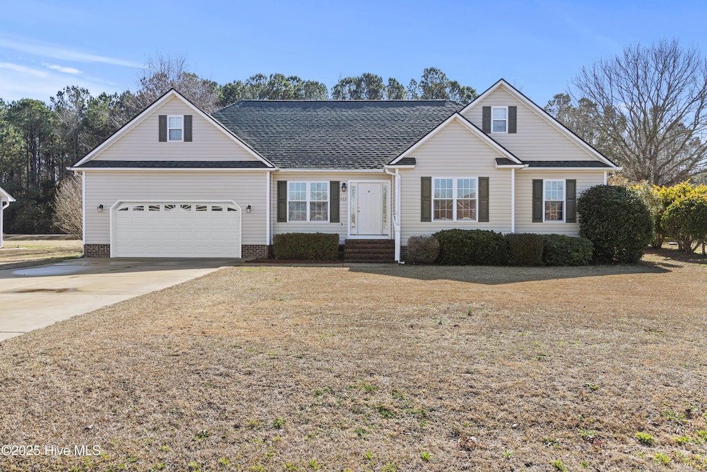 front of property with a garage